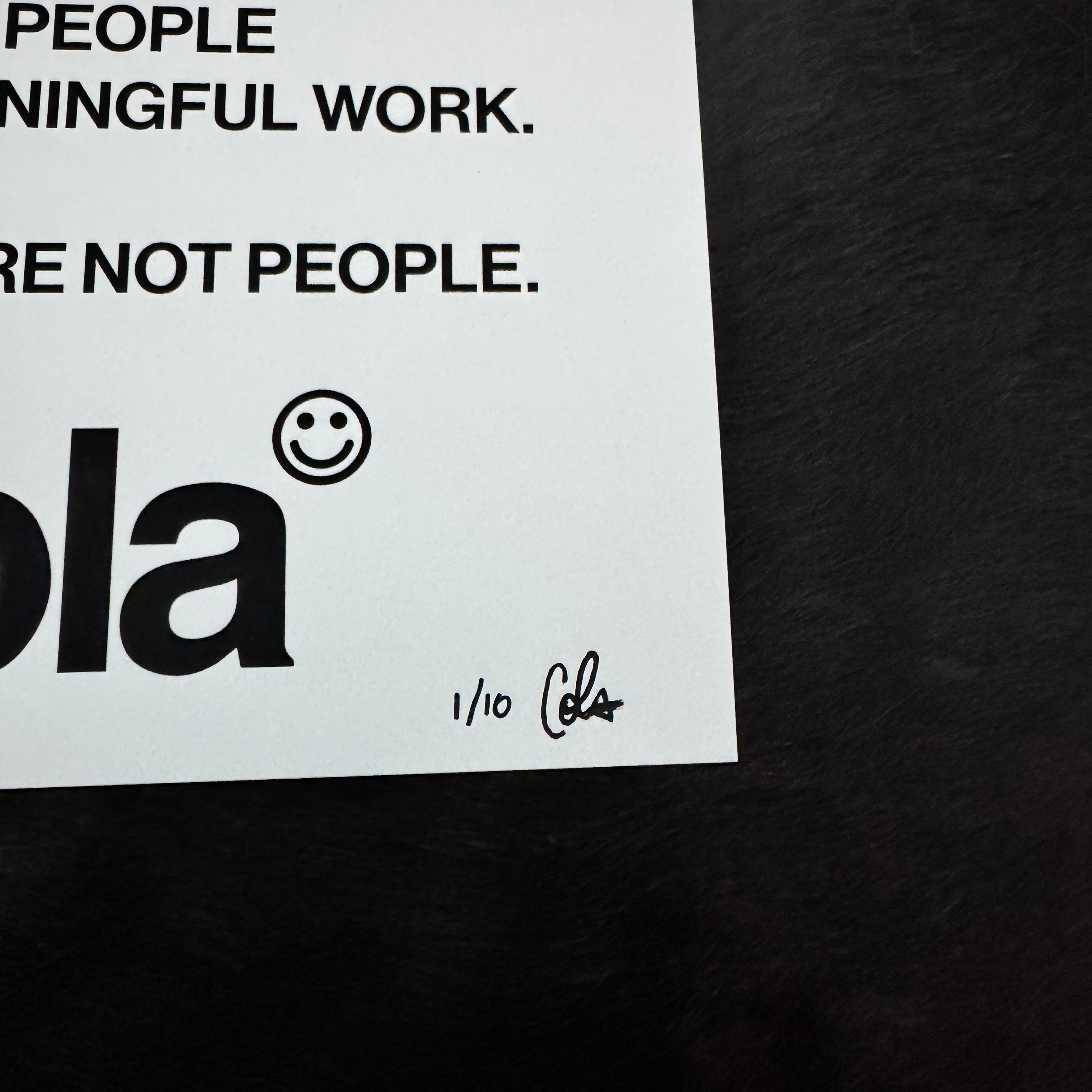 Close crop of the Cola Corp "6 Beliefs" giclée prints with signature and 1/10 notation in bottom right-hand corner.