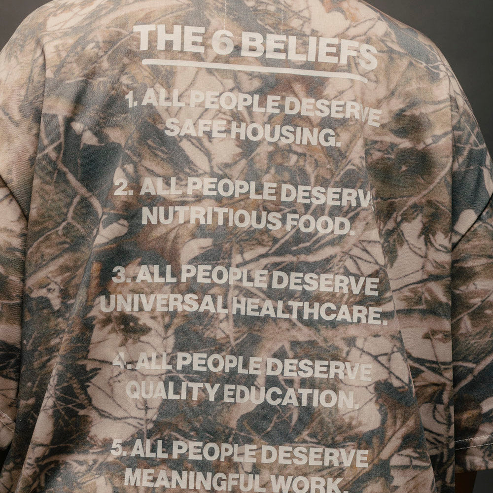"THE 6 BELIEFS" WOODLAND CAMO CROP TEE