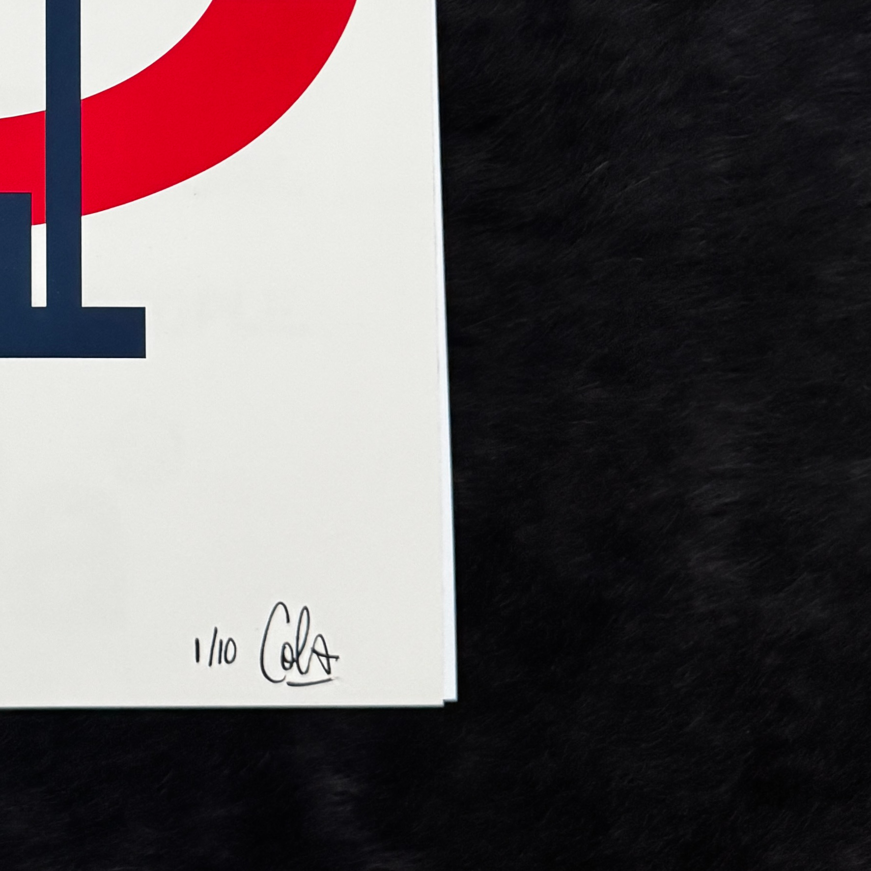 Close crop of signature and 1/10 notation in ink on bottom right corner of giclee print.