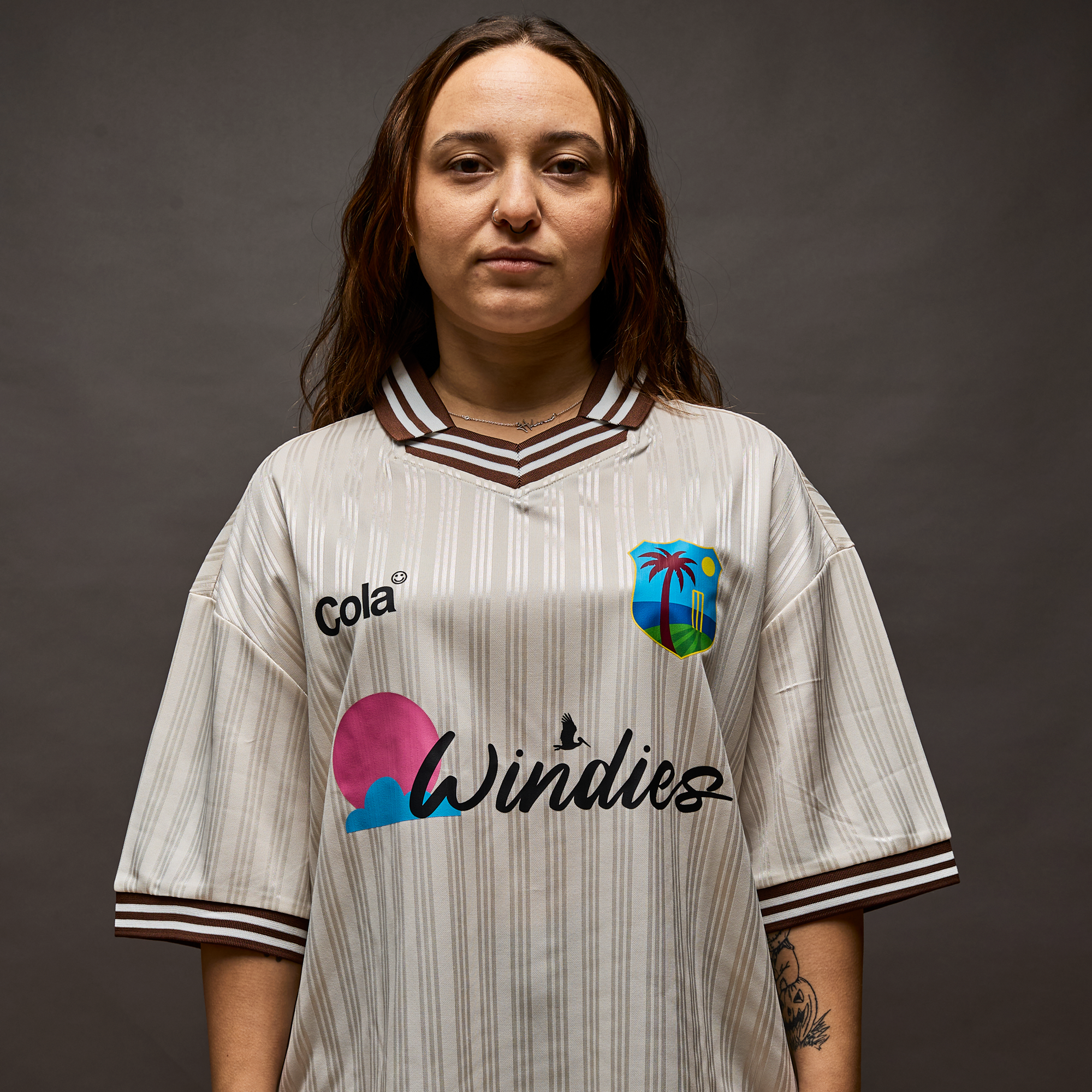 Windies Cricket Jersey front view with West Indies cricket crest, Windies logo, and Cola sponsor logo
