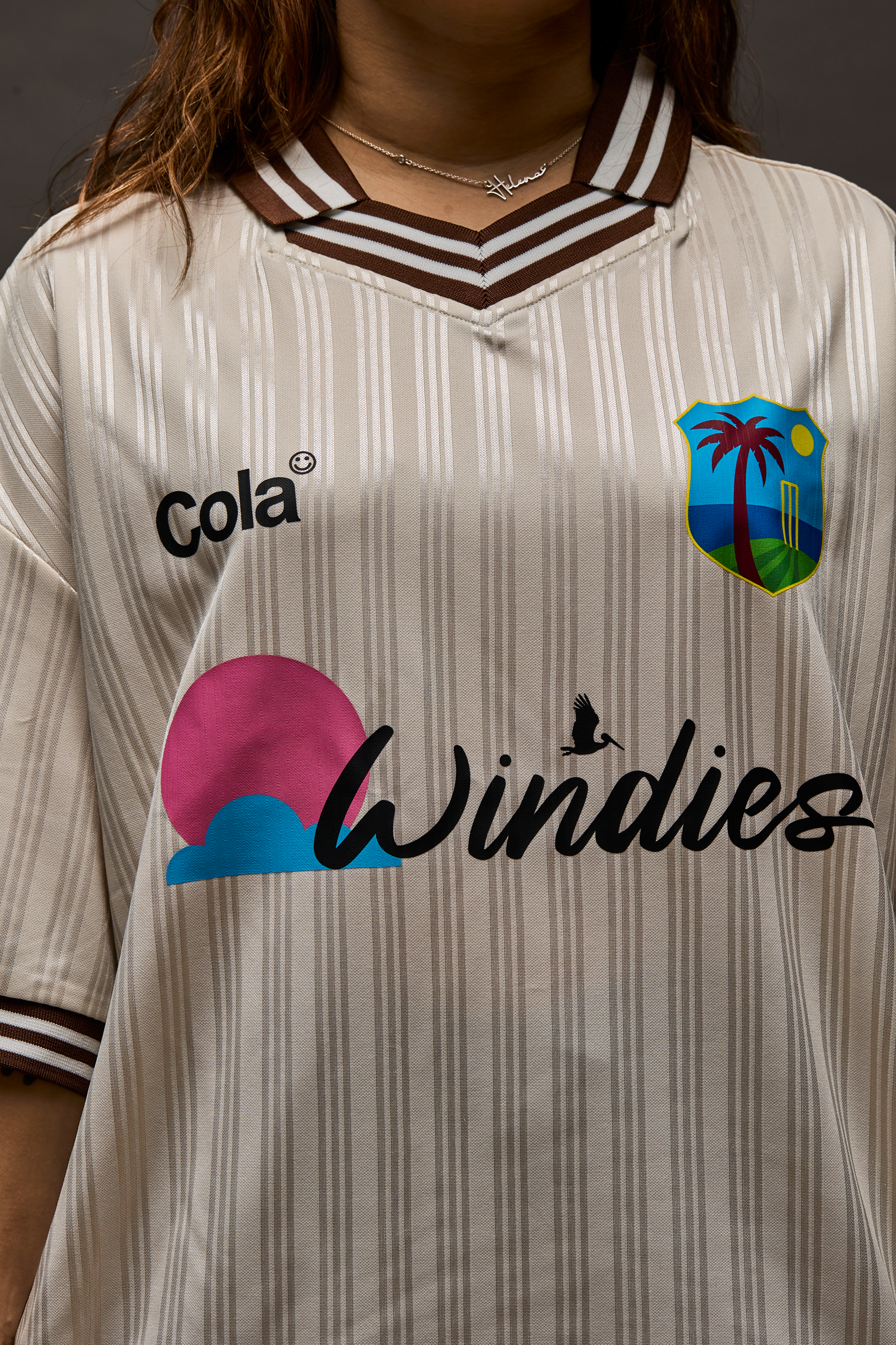 Windies Cricket Jersey front view with West Indies crest, Windies logo, and Cola sponsor logo
